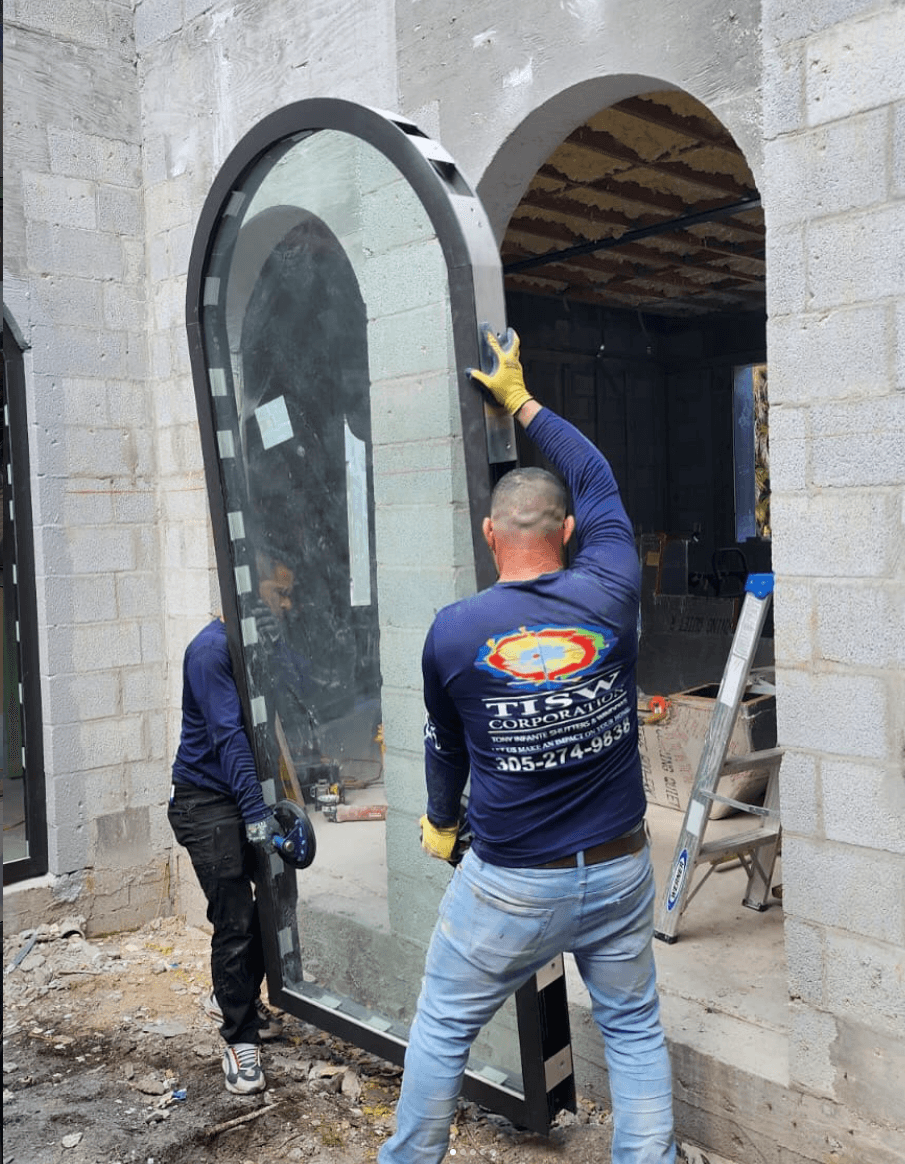 Window-installation crew in custom company shirts